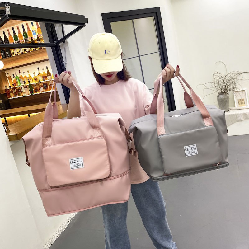 0点39.9元【伊莲旗舰店】大容量可折叠手提旅行包(NaZ82w7zjdr) CZ0000/折叠起来就是手包的大小面料防水，出行非常方便